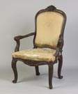 Carved Walnut Continental Armchair