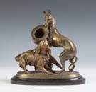 Bronze Sculpture of two dogs fighting over a hat