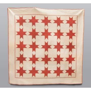 Quilt with Red Feather Stars