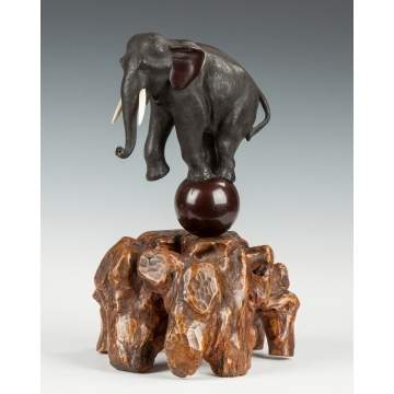 Bronze Elephant on Natural Root Base
