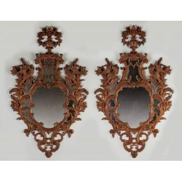 A Pair of Carved Continental Mirrors