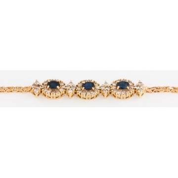Gold and Diamond Bracelet with Garnets