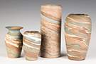 Four Niloak Art Pottery Vases