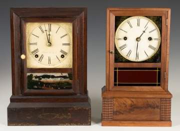 Two J.C. Brown Cottage Clocks