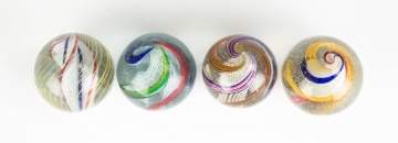 Four Vintage Open Core Swirl Marbles