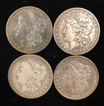 Four Liberty Head Silver Dollars