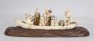 Carved Ivory Figural Group in Boat