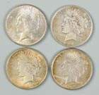 Four One Dollar Liberty Coins