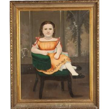 Portrait of a young girl in an armchair