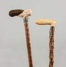 Two Wood Canes with Carved Handles