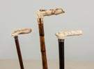 Three Wood Canes with Carved Handles