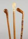 Three Wood Canes with Carved Handles