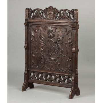 A Pair of Carved Oak Gothic Fire Screens