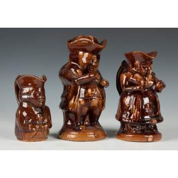 Three Glazed Toby Pitchers
