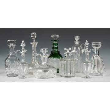 Nine Cut and Engraved Glass Decanters and Cruets
