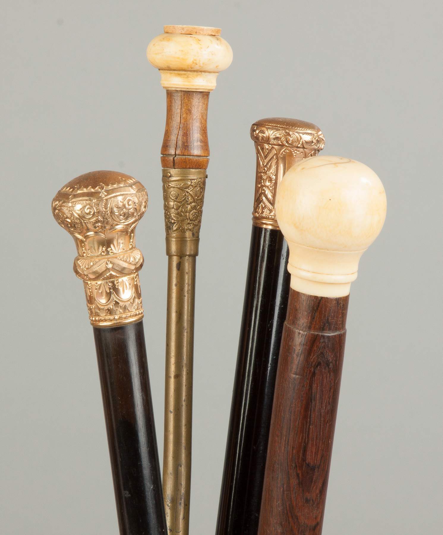 Group of Four Vintage Canes Cottone Auctions