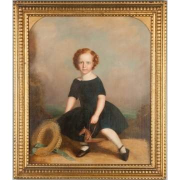 Portrait of Young Girl with Hat and Horse Ride Toy