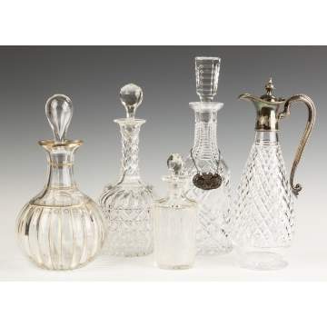 Group of Various Cut Glass and Etched Decanters  and  Ewer with Silver Plate Mounts