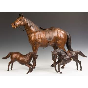 Three Molded and Leather Horses