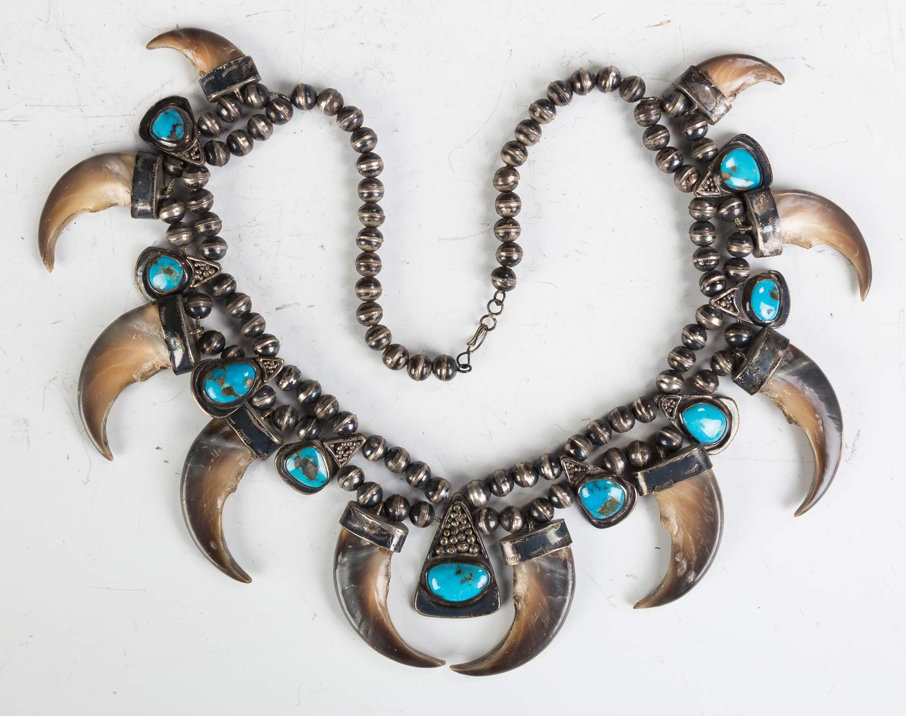 Hand carved turquoise and ster claw necklace