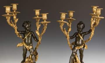 Pair of French Gilt and Patinaed Bronze Candelabras