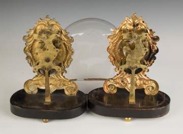 Two Stamped Brass Clocks