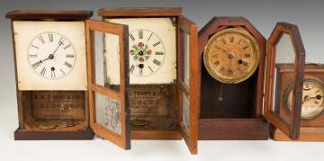 Four Miniature Cottage Clocks