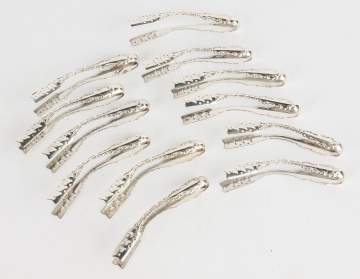 Twelve Whiting Sterling Silver Tongs