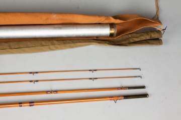 Four Fishing Reels and Four Fly Rods