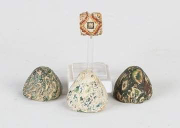 Phoenician Glass Bead and Three Roman Glass Gaming Pieces