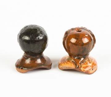 Two Decorated Redware Doll Heads