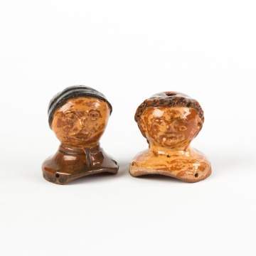 Two Decorated Redware Doll Heads