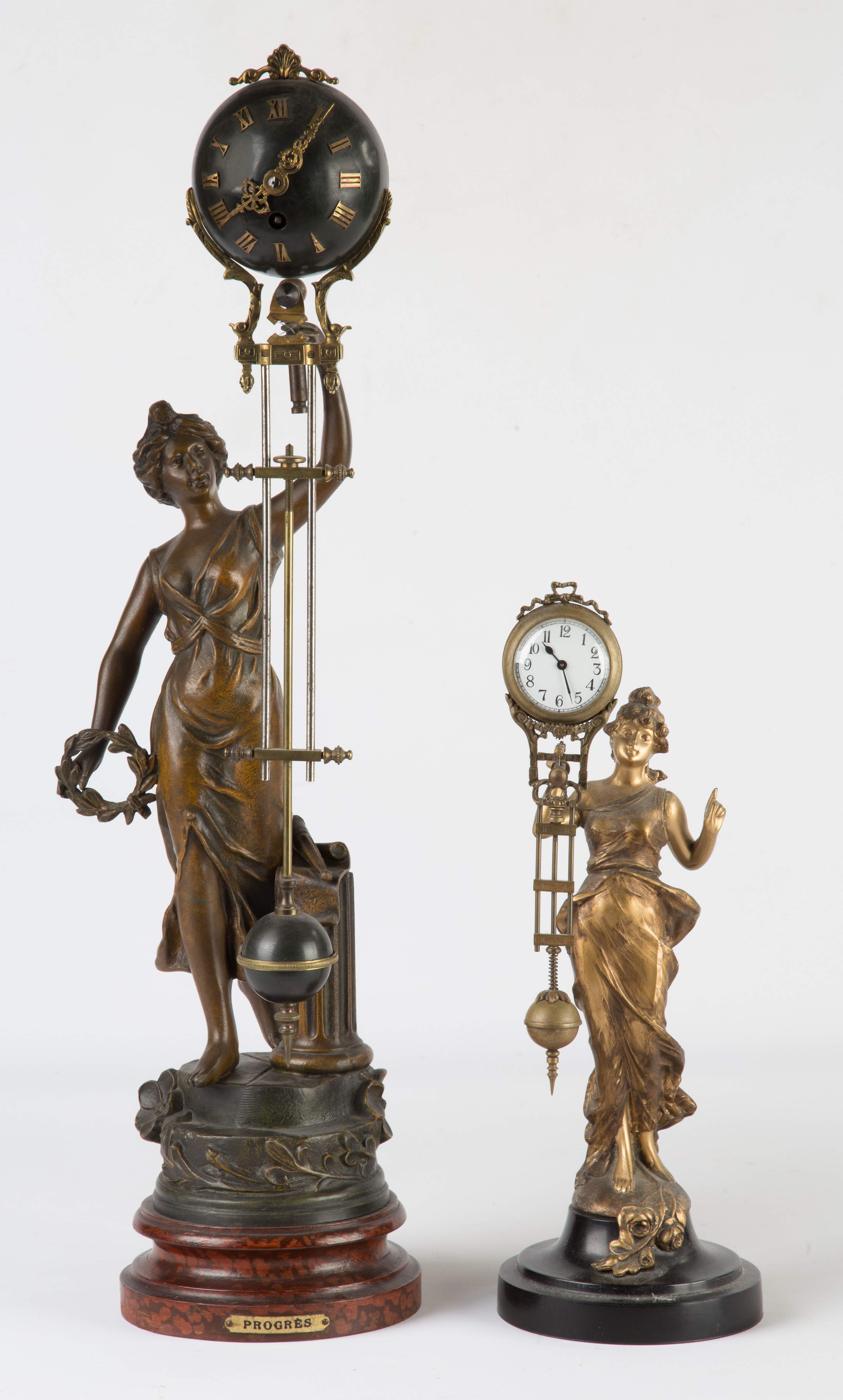 Swinger Clocks | Cottone Auctions