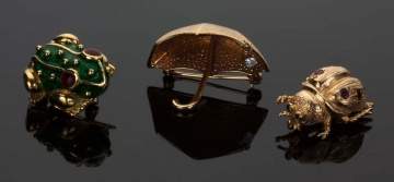 Three Gold Pins