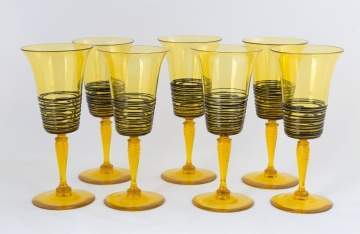 Seven Steuben Bristol Yellow Goblets with Black Threading