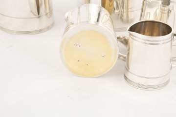 W.H. Glenny & Co. Five Sterling Silver Measuring Pitchers