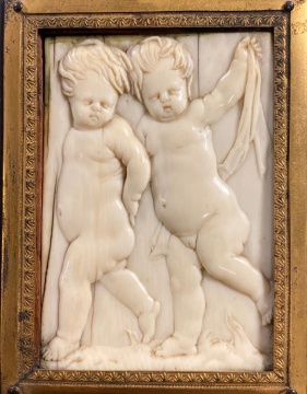 Early Carved Bone Plaque of Putti Figures
