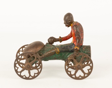 Cast Iron Monkey Cracking Coconut Bell Ringer Toy