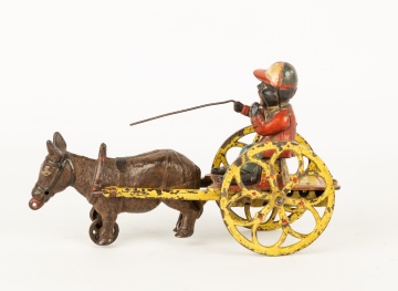 J & E Stevens Cast Iron Jockey with Mule Pull Toy