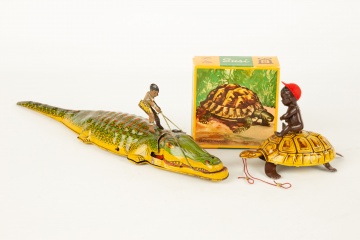 Susi Tin Plate and Celuloid with J. Chein Tin Wind Up Alligator and Rider