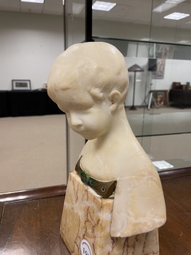 Carved Alabaster Sculpture of a Young Boy