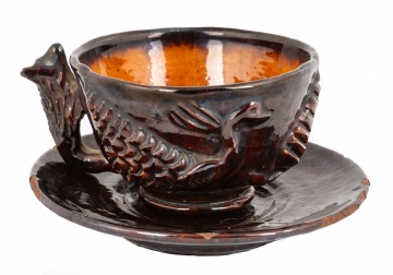 19th Century Redware Cup and Saucer with Dog  Handle and Peacocks