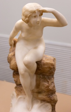 Alabaster Sculpture of Woman Perched on Rock