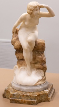 Alabaster Sculpture of Woman Perched on Rock