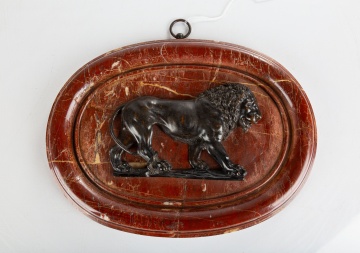 Pair of Early Bronze Mounted Lions on Marble Plaques