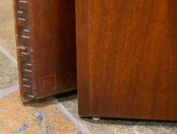 Frank Lloyd Wright (American, 1867-1959) Taliesin Cocktail Table and Six Stools