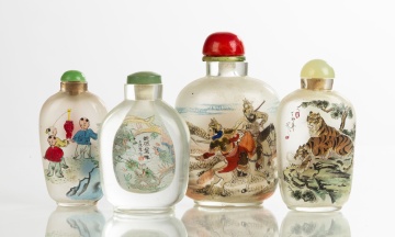 Four Reverse Painted Snuff Bottles
