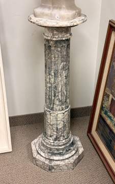 A Variegated Marble Pedestal