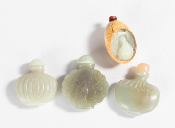 Four Carved Jade Snuff Bottles
