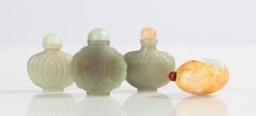 Four Carved Jade Snuff Bottles